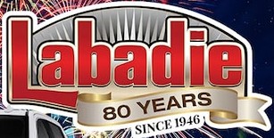 Labadie logo with “80 Years Since 1946” banner, fireworks in background.